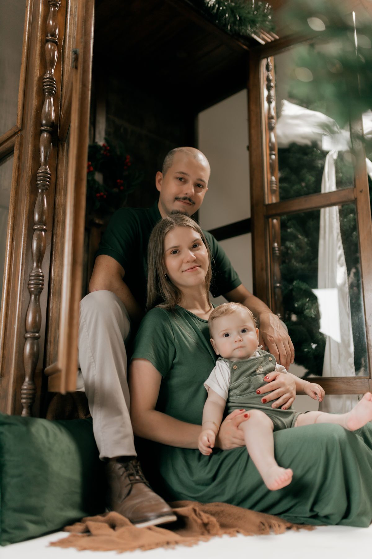 A young family relaxing together in their living room